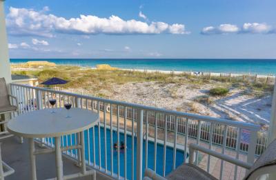 Blue Dolphin #201 Beach Front Condo, Pool, Gulf Living, and Covered Parking