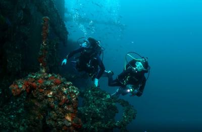 Divers on the USS Oriskany