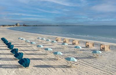 Discover St. Pete Beach luxury with cabanas, umbrellas, and endless ocean views.