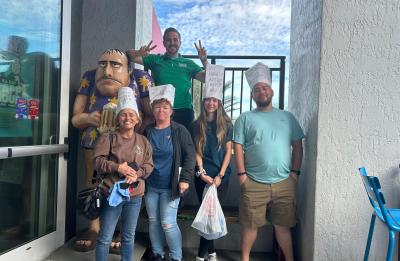 Guests posing with our Dick's Statue and fellow manager