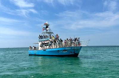 Our flagship vessel, Frisky Mermaid in the Gulf waiting for the Blue Angels practice to start.
