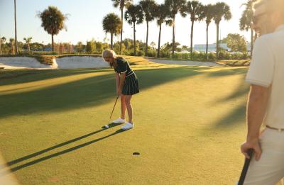 A couple enjoying Saddlebrook golf