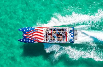 Red, white, and blue from bow to stern.