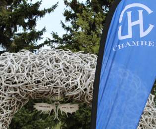 jackson hole chamber flag and antler arch
