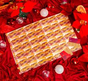 An image of wrapping paper with Arby's sandwiches