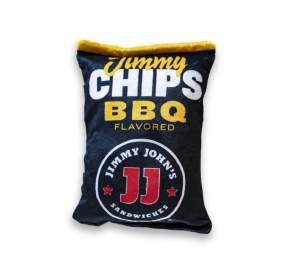 An image of a plush dog toy design to look like a bag of Jimmy John's branded BBQ chips. The bag is black and the is yellow, white, and red font.