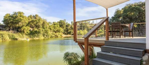 A porch along the banks of the water.