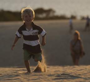 Kid Running in Outer Banks of North Carolina beach