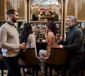 Friends gathered at a hotel bar