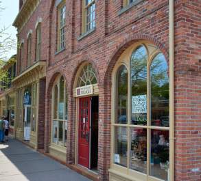 Heritage building with a red door on the main street