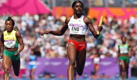 Three women runners in relay