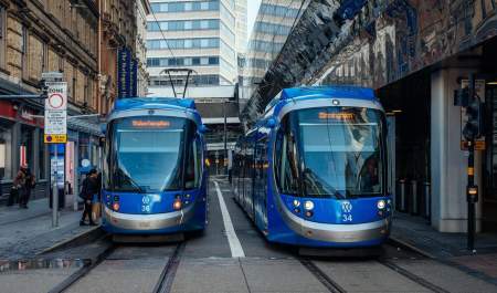 Two blue West Midlands trams