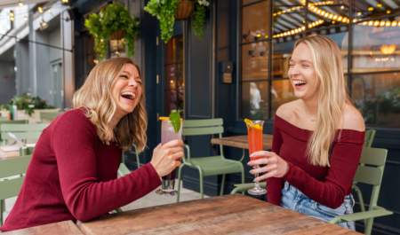 Ladies enjoying cocktails at Flight Club Cheltenham