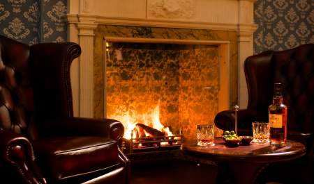 Fireplace in the lounge at GreyFriars Hotel
