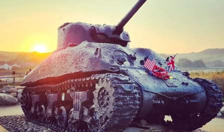 Sherman Tank at Slapton Sands with sunset in background