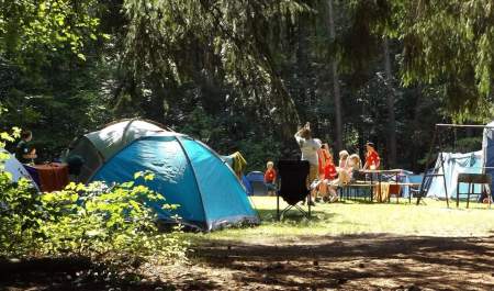 a series of tents in a campsite