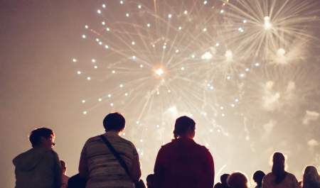 People looking up at the sky as a huge fireworks display takes place in East Yorkshire
