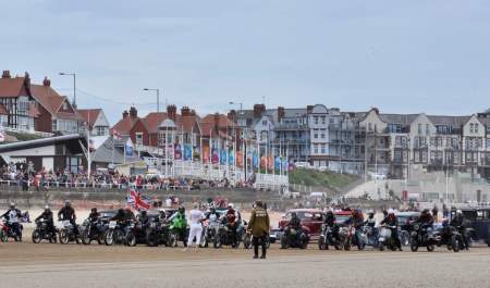 Vintage vehicles lined up along Bridlington's south beach for the start of Race the Waves