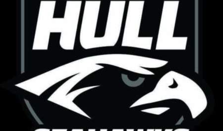 A logo depicting a cartoon hawk head on a white shield with the words 'Hull Seahawks' above and below.