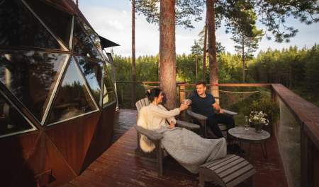 Two sitting and enjoying themselves in the treetops of the treetop domain