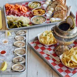 Table of food at Island Creek Oysters