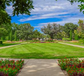 Oakdale Park with trees and a blue sky