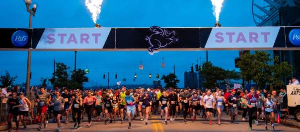 Image is of the starting line of the Flying Pig Marathon.