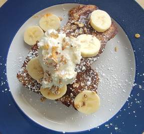 french toast with bananas on table