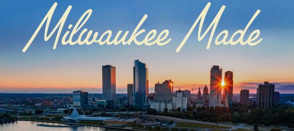 Milwaukee skyline at sunset with the words Milwaukee Made in script over the top
