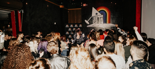 Interior image of This Is It! During a DJ set