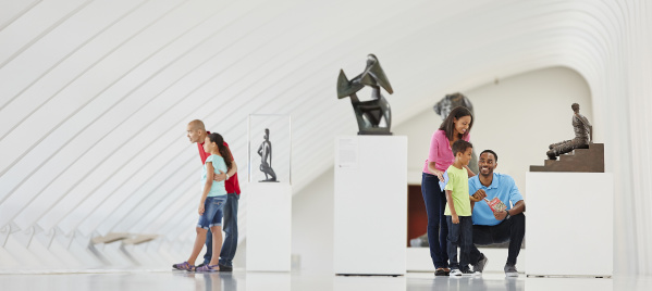 Familes looking around the Milwaukee Art Museum