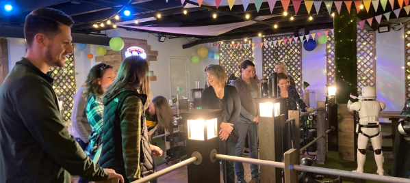 A group of friends enjoying mini golf at Nine Below on Milwaukee's East Side