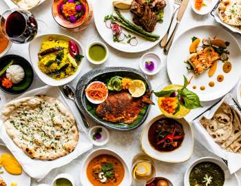 Dinner spread from Mahesh's Kitchen located at Sugar Land Town Square.