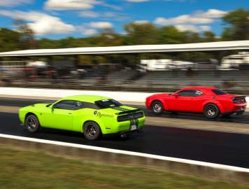 Two MoPar cars drag racing at Beech Bend Park