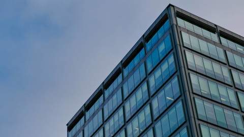 The top corner of the Colmore Building on Colmore Row, viewed from the street
