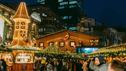 The bright lights of the Christmas market light up the night in Birmingham