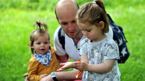 Children in the Cotswolds with a ladybird