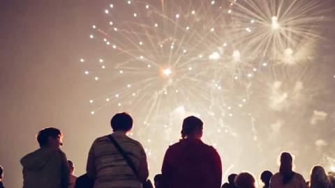 People looking up at the sky as a huge fireworks display takes place in East Yorkshire