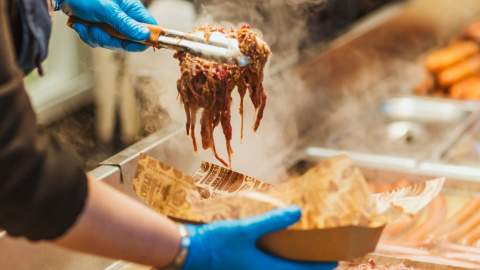 Someone making up a carvery sandwich at the Beverley Festival of Christmas
