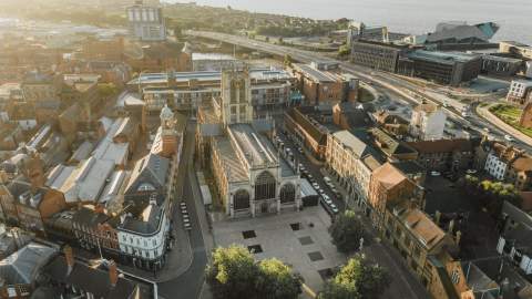 Ariel shot of Trinity square, featuring the minster, The Deep and surrounding areas.
