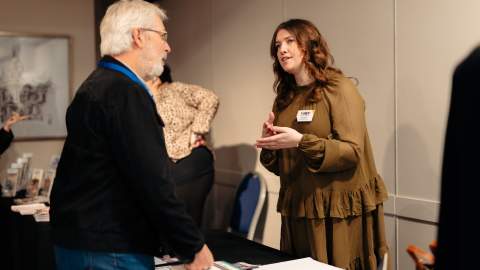 VHEY colleague speaking to delegate at VHEY Tourism Conference 2026
