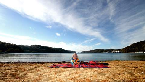 Child on beach at Rosfjord Lyngdal