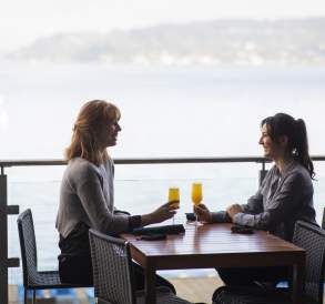 2 women enjoying drinks at Water's Table