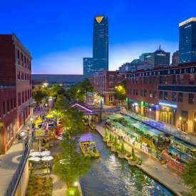 Skyline view of the Bricktown Canal and Water Taxi