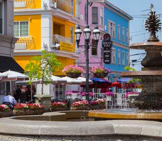 Patio seating surrounds the fountain at DePasquale Square in the Federal Hill neighborhood of Providence