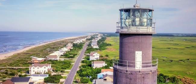 Drone shot of the Oak Island Lighthouse Last lighthouse built in North Carolina