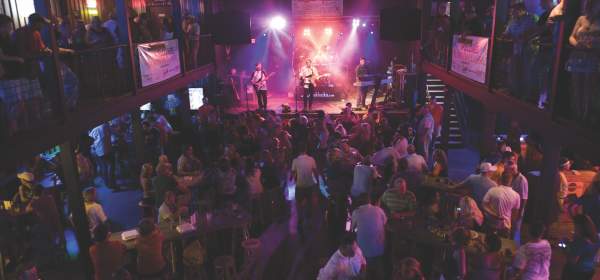 A crowd watches a show at the The Sound Room in Fort Smith.
