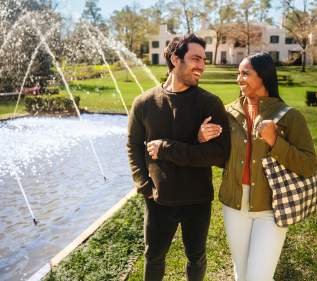 Couple walking at a park