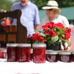 Strawberry jam jars on display