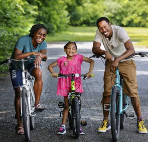 african american family bikes park
